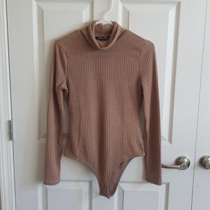 Beige turtleneck bodysuit